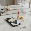 MM Floral Monogram Phone Case on marble vanity with pearl earrings